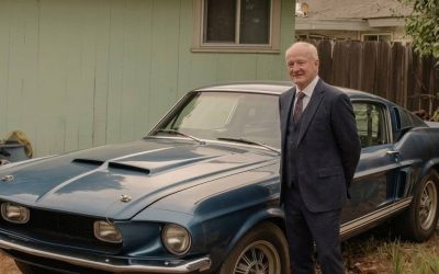 My stepmom sold my father’s favorite old car on the day of his funeral — she turned pale after discovering what was hidden under the spare tire. My dad d:ied last Tuesday. Massive heart attack. No warning. He was 67. After my mom passed five years ago, he was my only close person. Karen — my stepmother — said she was “too fragile” to attend the funeral. She claimed the stress might “trigger her heart.” I believed her. So while I stood at the pulpit reading the eulogy I had rewritten three times through tears, she wasn’t at home grieving. She was selling his car. Dad’s pride and joy was a midnight blue 1967 Shelby GT500. His father bought it new. Dad spent thirty years restoring it bolt by bolt. Karen hated it. She called it “a rusted retirement fund.” As the service ended and we stepped into the parking lot, I saw a flatbed pulling away. With the Shelby strapped on top. Karen was standing on the curb, stuffing a thick envelope of cash into her purse. I sprinted over, my blood boiling. “What did you do?!” I screamed. “I sold it,” she said coldly. “I got ,000. It’ll be my little financial cushion. Don’t look at me like that. It’s just a car, and I’m the grieving spouse.” The car was worth easily six figures. She had practically given it away out of spite and greed before his body was even in the ground. I was shaking with rage when a sedan screeched to a halt next to us. A man jumped out, looking panicked, holding a dusty, sealed plastic bag. “Wait!” he yelled. “We were checking the spare tire well for rust before transport and found this. My boss said he couldn’t in good conscience keep it without you seeing it first.” Karen scoffed and snatched the bag. “Probably just more trash or old parts.” She tore it open. When she saw WHAT was inside, her knees buckled. She hit the pavement hard, gasping for air like she’d been punched in the gut. She looked up at me, her face drained of color, and handed me the envelope. It began: “Karen, I know you very well, so I decided