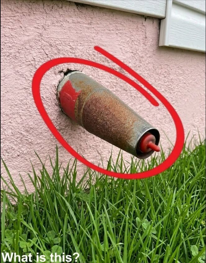 I noticed this on the wall of my garage. The house was built in 2003. The whole family has been looking at it for an hour, but we still can’t figure out what it is. Does anyone know what this is? Check the first comment for the answer