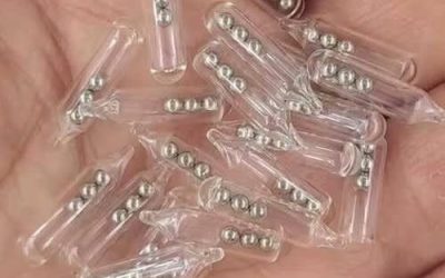 Identifying Small Glass Tubes Containing Three Tiny Ball Bearings