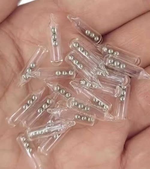 Identifying Small Glass Tubes Containing Three Tiny Ball Bearings